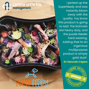 Dog food container with Super Feedy branding and a quote from Dr. Hannah Capon on a wooden surface.