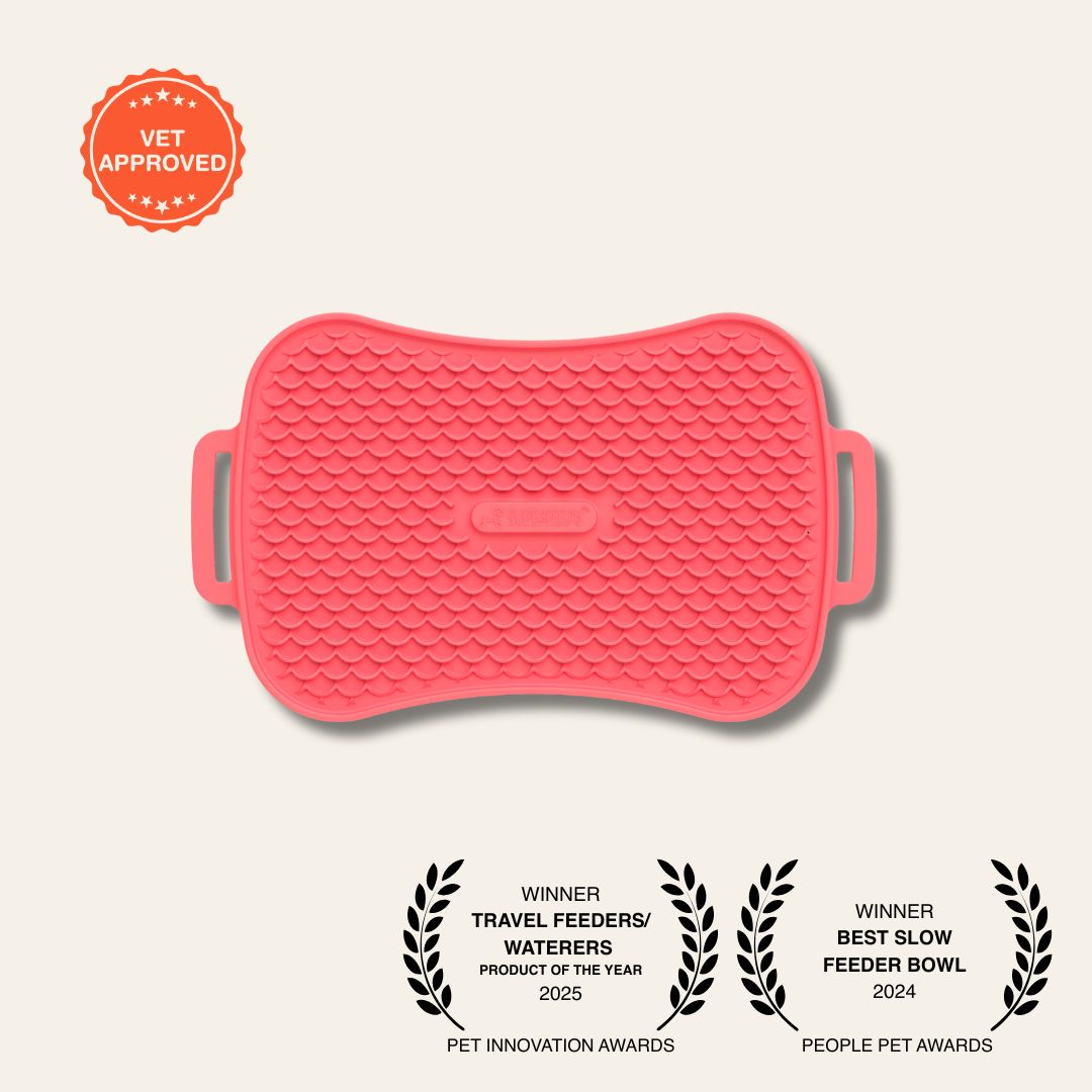 Ocean Red silicone mat with awards on a light gray background