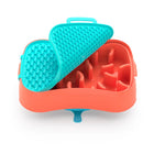 Super Feedy 4-in-1 slow feeder dog bowl in Ocean Red with teal reversible lick mat lid clipped on top